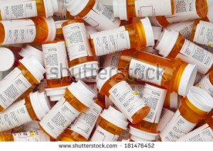 stock-photo-dozens-of-prescription-medicine-bottles-in-a-jumble-this-collection-of-pill-bottles-is-symbolic-of-181476452