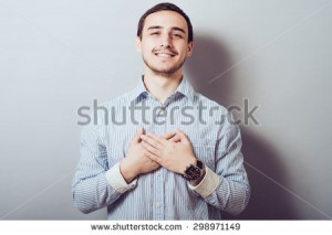 stock-photo-handsome-male-resting-hands-on-his-chest-298971149