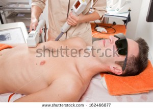 stock-photo-young-man-receiving-laser-epilation-on-beauty-center-162466877